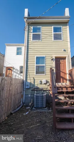 a view of a backyard with swing