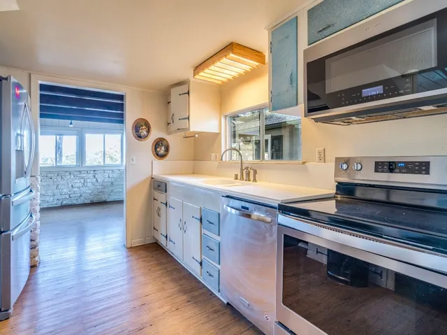 a bathroom with a bathtub and a sink