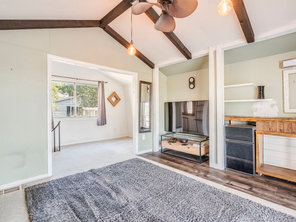 236 Cedar Hurst Lane Austin, TX 78734 - Photo 24 of 31 a view of hallway with window and cabinet
