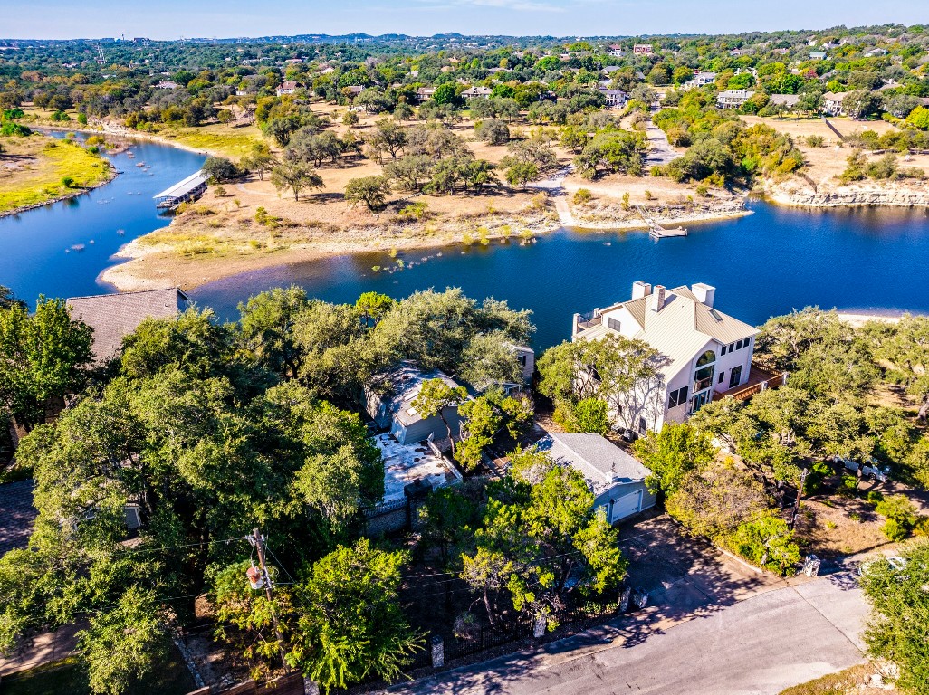 236 Cedar Hurst Lane Austin, TX 78734 - Photo 4 of 31 a view of a lake with boats and trees all around