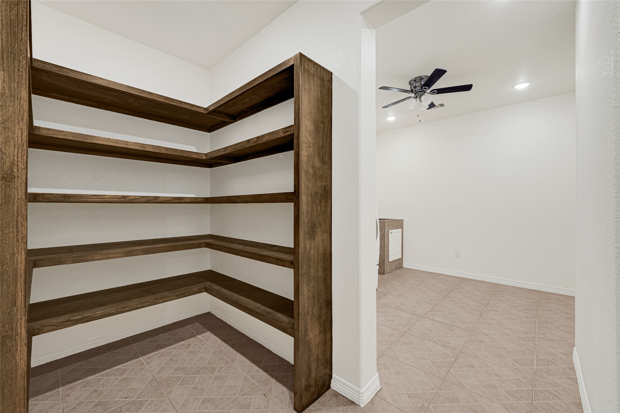 404 Moss Street Houston, TX 77009 - Photo 32 of 39 a view of an empty walk in closet