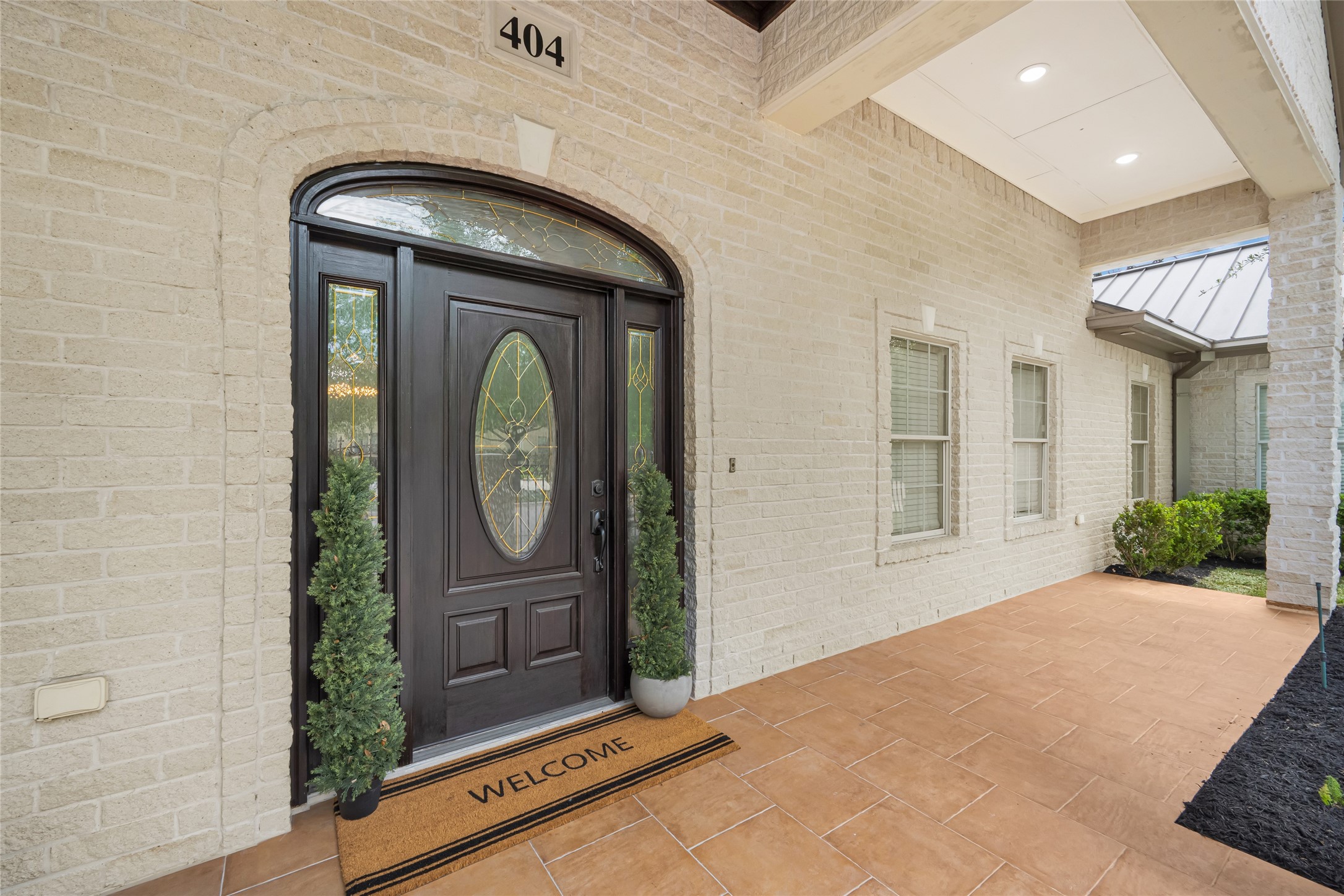 404 Moss Street Houston, TX 77009 - Photo 5 of 39 a front view of a house with garden