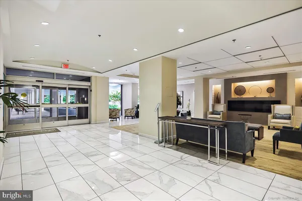 a open kitchen with stainless steel appliances kitchen island granite countertop a sink and cabinets