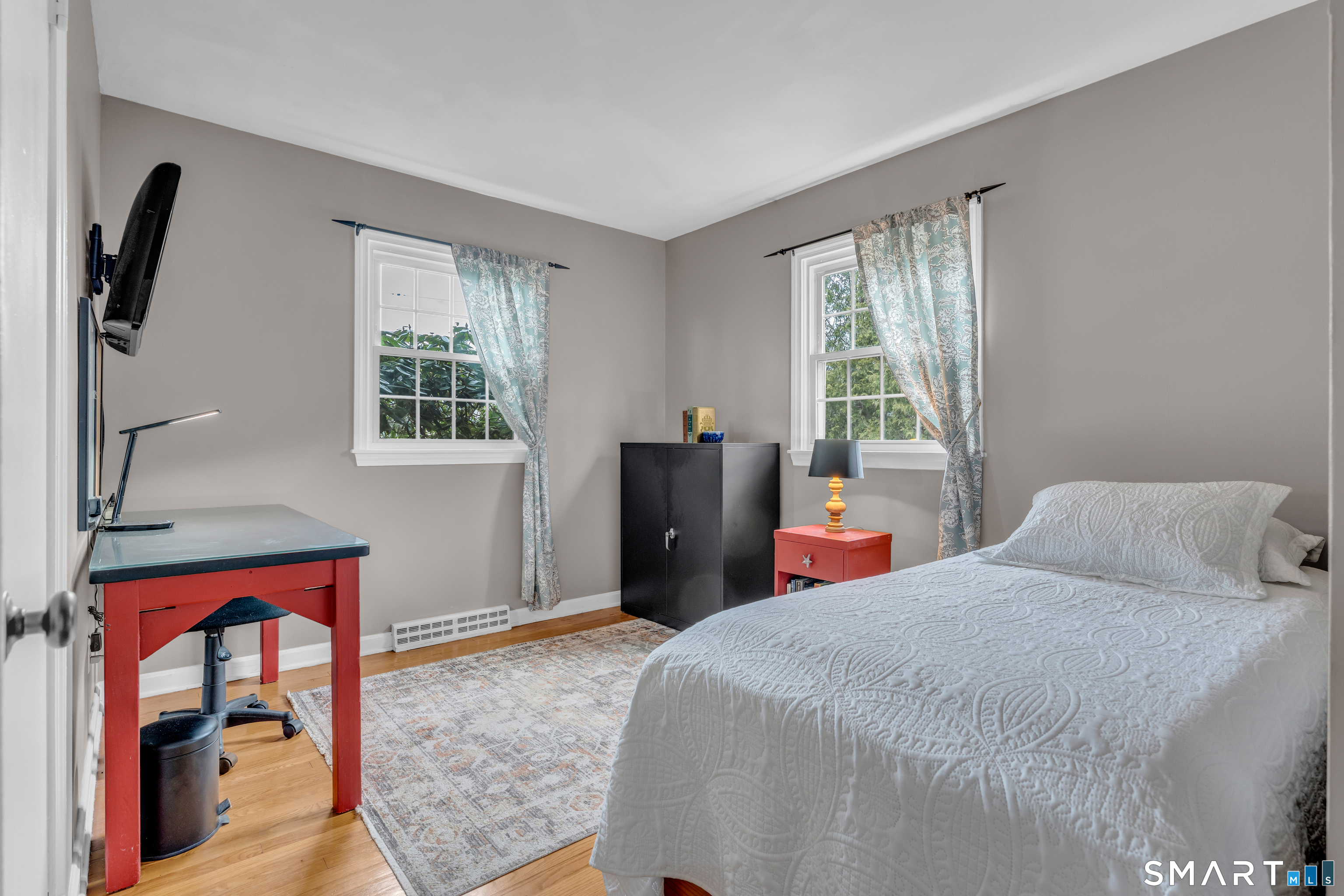 82 Raymond Road Guilford, CT 06437 - Photo 13 of 33 a bedroom with a bed and a window