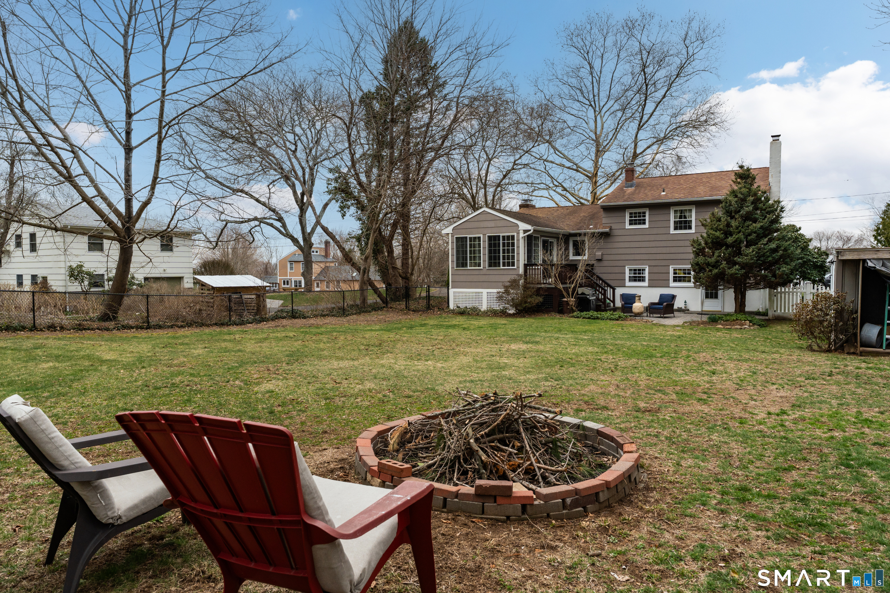 82 Raymond Road Guilford, CT 06437 - Photo 26 of 33 a view of a house with a yard