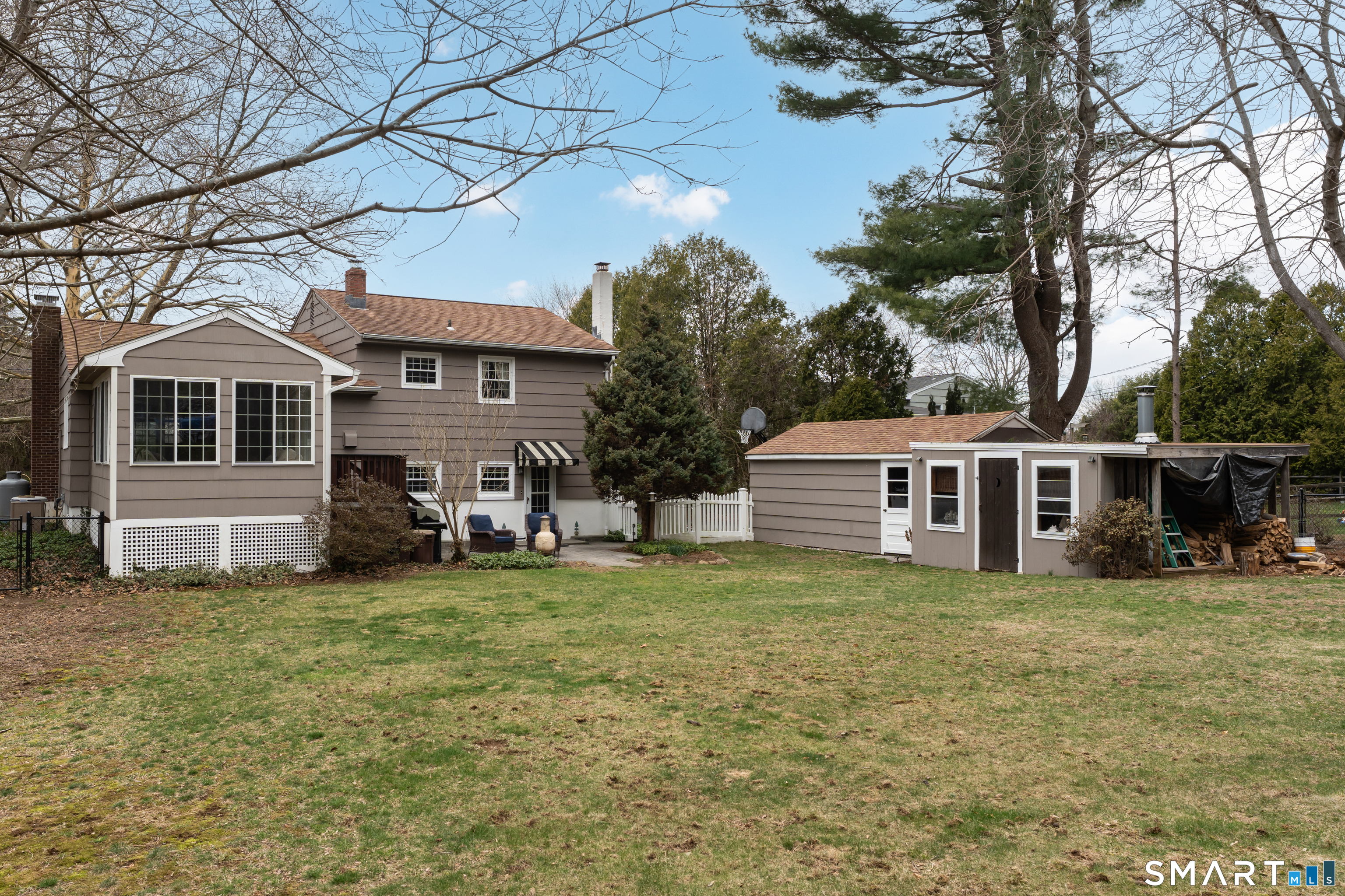 82 Raymond Road Guilford, CT 06437 - Photo 29 of 33 a view of a house with a yard