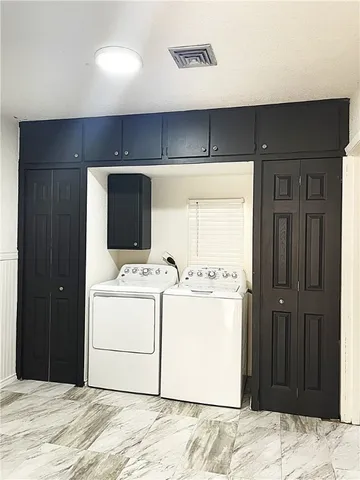 a view of kitchen and utility room