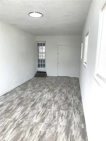 an empty room with windows