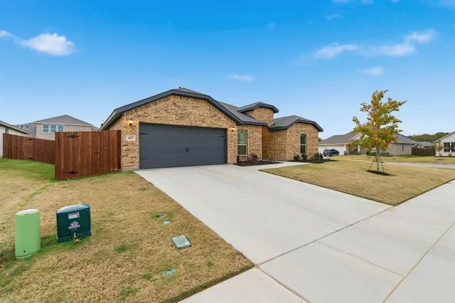 a view of outdoor space yard and front view of a house