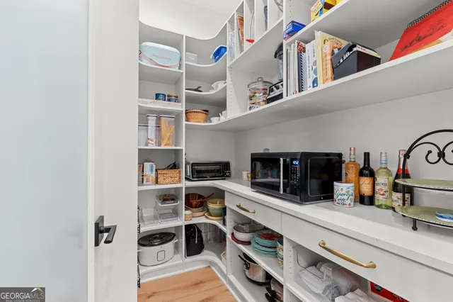 a view of living room with furniture and flat screen tv