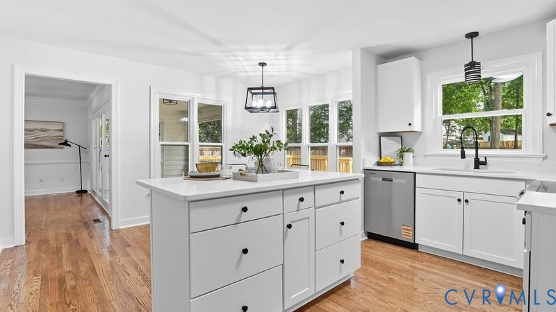 12601 Eagle Ridge Road Henrico, VA 23233 - Photo 11 of 50 Kitchen with white cabinets, a center island, deco