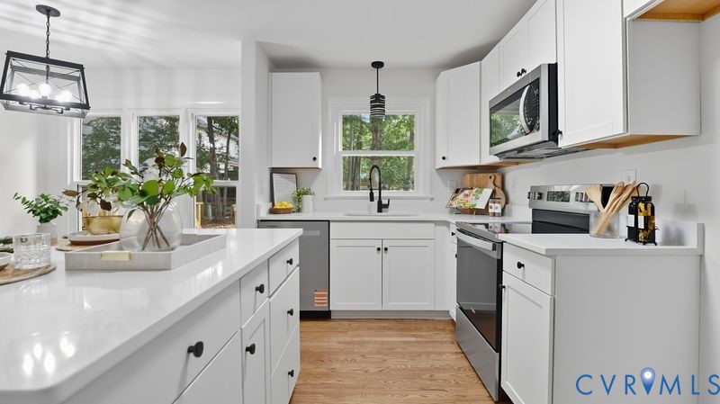 12601 Eagle Ridge Road Henrico, VA 23233 - Photo 12 of 50 Kitchen with stainless steel appliances, light woo