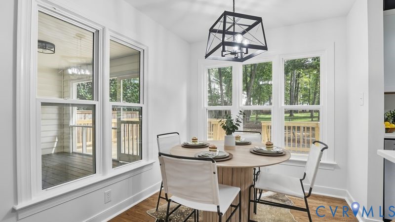 12601 Eagle Ridge Road Henrico, VA 23233 - Photo 16 of 50 Sunroom with plenty of natural light and a chandel