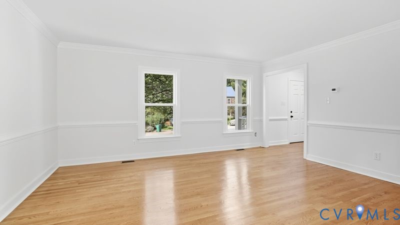 12601 Eagle Ridge Road Henrico, VA 23233 - Photo 21 of 50 Empty room with crown molding and light wood-type