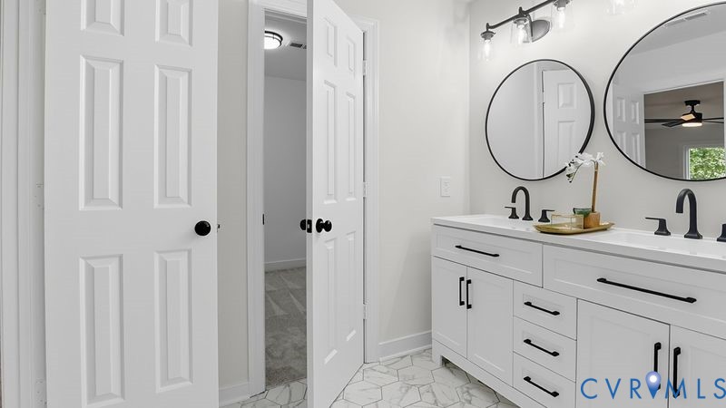 12601 Eagle Ridge Road Henrico, VA 23233 - Photo 27 of 50 Bathroom featuring double vanity and ceiling fan