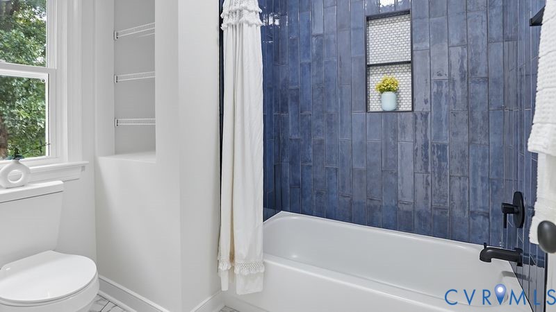 12601 Eagle Ridge Road Henrico, VA 23233 - Photo 28 of 50 Bathroom featuring shower / tub combo and plenty o