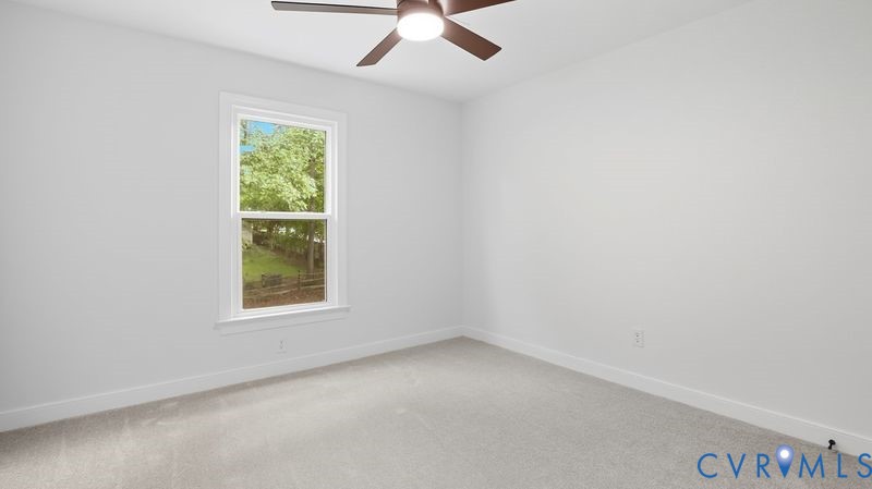 12601 Eagle Ridge Road Henrico, VA 23233 - Photo 33 of 50 Empty room featuring light colored carpet and a ce