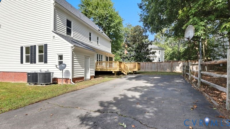 12601 Eagle Ridge Road Henrico, VA 23233 - Photo 38 of 50 View of side of home with a wooden deck and a shin