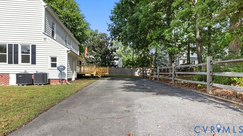 12601 Eagle Ridge Road Henrico, VA 23233 - Photo 39 of 50 View of side of property featuring a wooden deck a