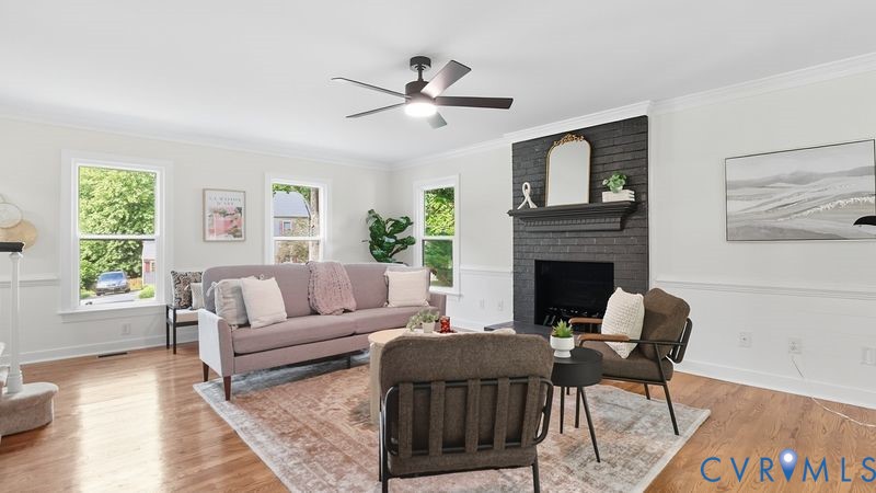 12601 Eagle Ridge Road Henrico, VA 23233 - Photo 7 of 50 Living area with a fireplace, light wood-style flo