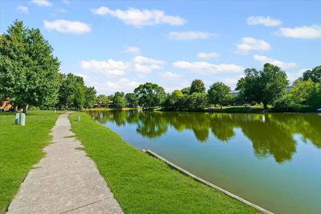 a view of a lake with a garden and lake view