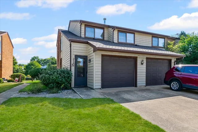 a view of a car in front of house