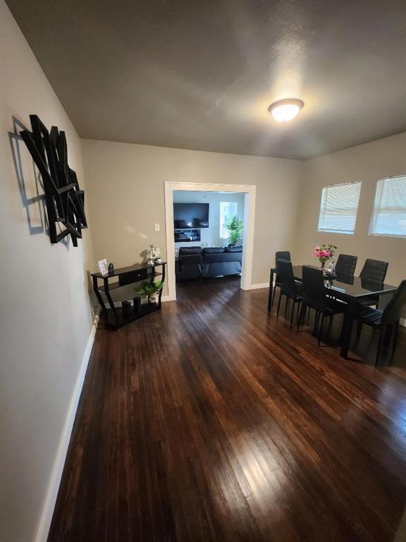 3736 Colonial Avenue Dallas, TX 75215 - Photo 8 of 9 a living room with furniture and wooden floor