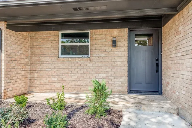 a view of entrance gate of a house
