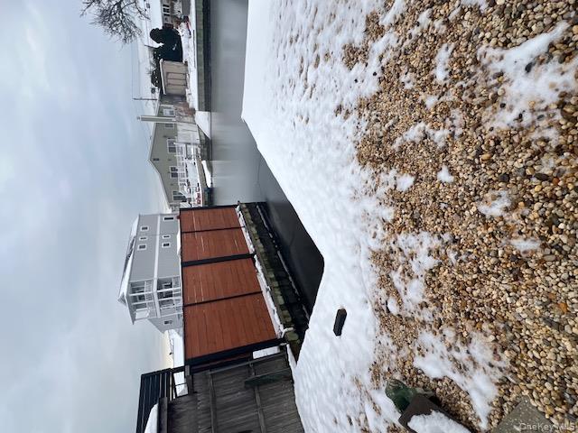 817 Ocean Street Lindenhurst, NY 11757 - Photo 12 of 14 a view of a living room and kitchen