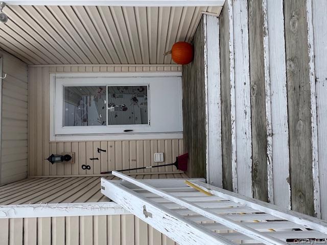 817 Ocean Street Lindenhurst, NY 11757 - Photo 3 of 14 a view of wooden door and a window