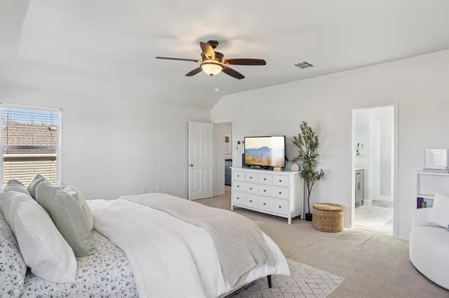 a bathroom with a sink double vanity and a mirror