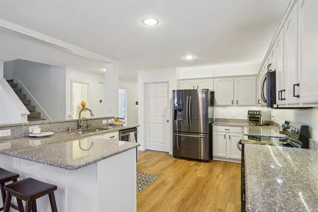 a room with furniture and a book shelf