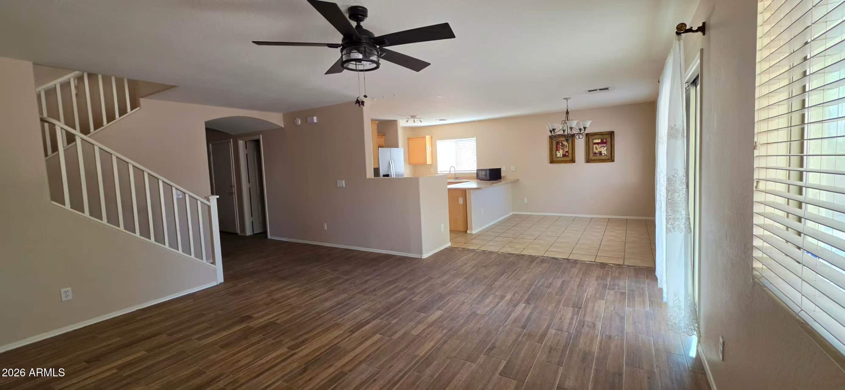 8634 West Cordes Road Tolleson, AZ 85353 - Photo 3 of 6 Living room look to kitchen