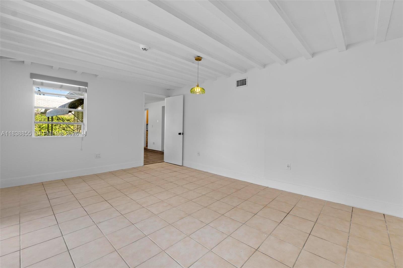 738 Fernwood Road Key Biscayne, FL 33149 - Photo 15 of 39 a view of an empty room