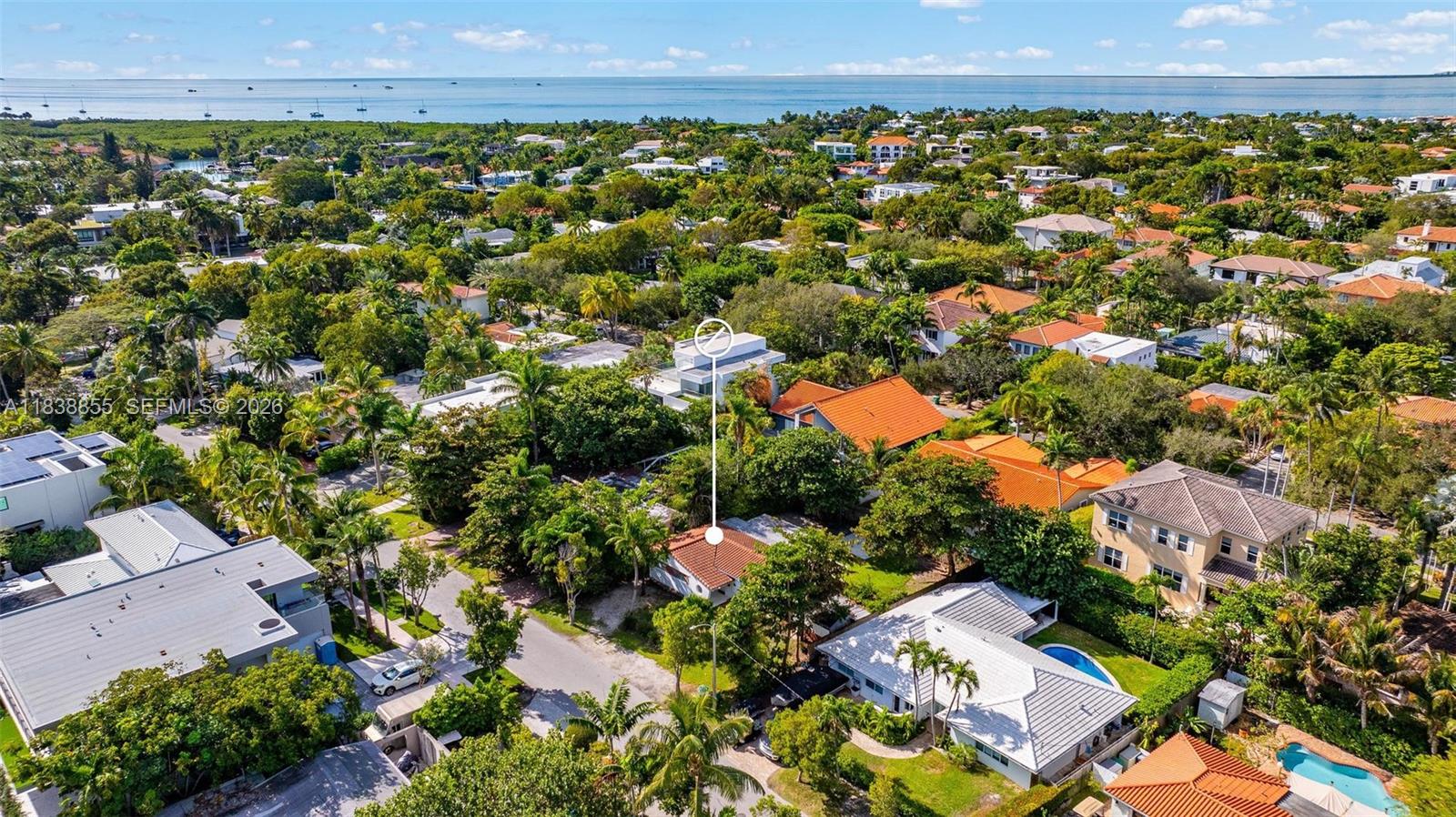 738 Fernwood Road Key Biscayne, FL 33149 - Photo 21 of 39 an aerial view of a residential houses with a yard and mountain