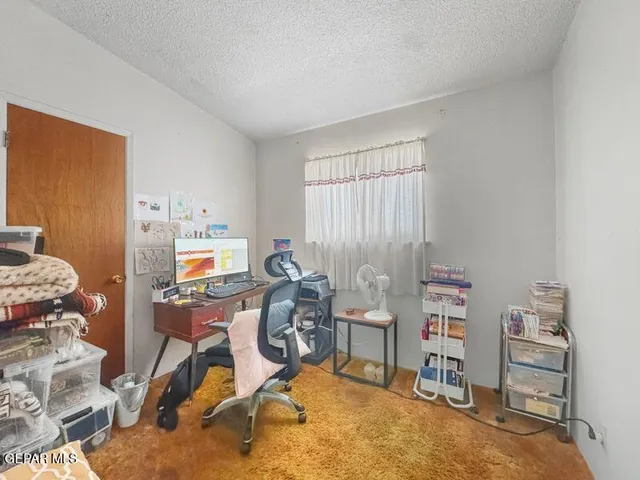 a room with furniture and a window