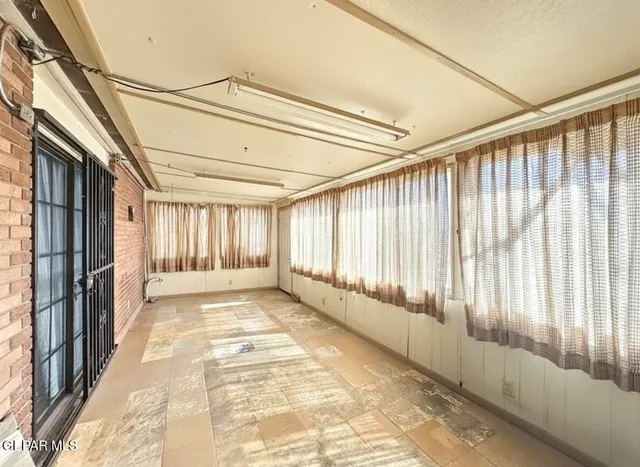 a street view with a building in the background