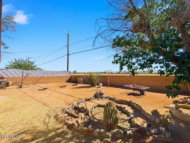 a view of swimming pool with seating space
