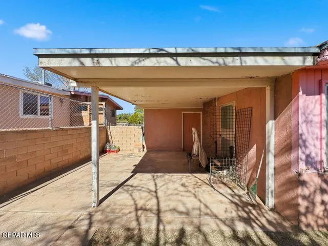 a view of a backyard of the house