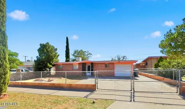 a view of a swimming pool with a patio
