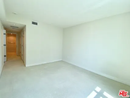 a bathroom with a sink a toilet a shower and a mirror