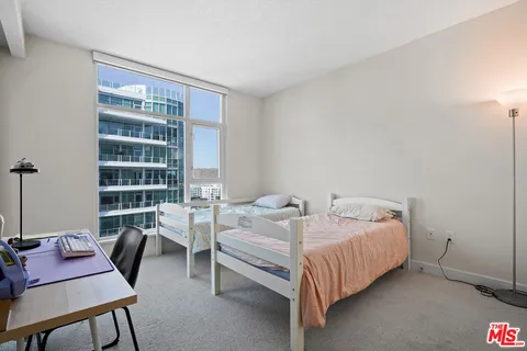 a bathroom with a double vanity sink and a bathtub