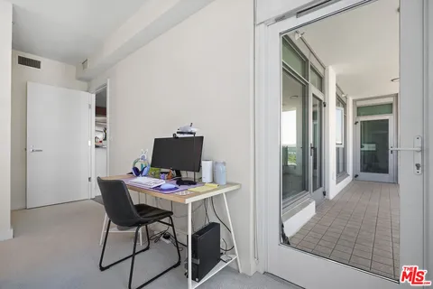 a view of a glass door of the house