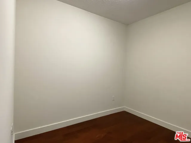 a view of a swimming pool with outdoor seating