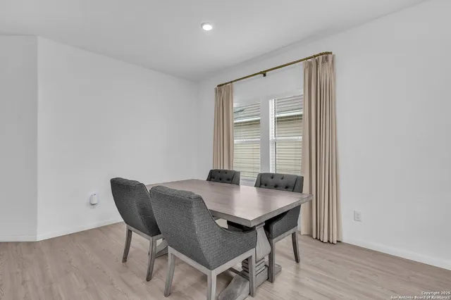 a workspace with furniture and wooden floor