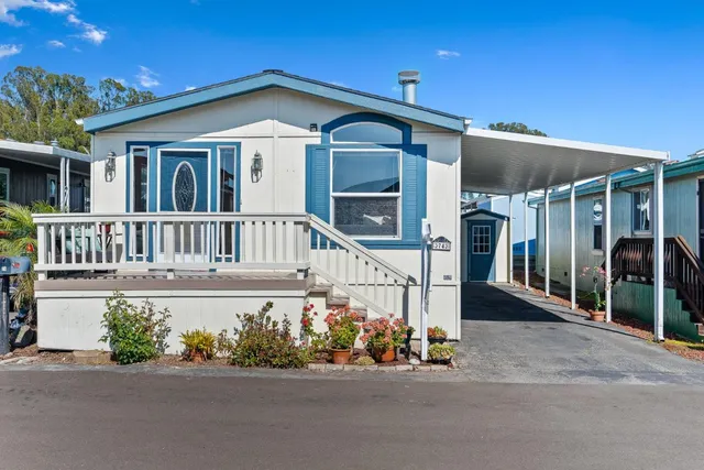 a front view of a house with porch