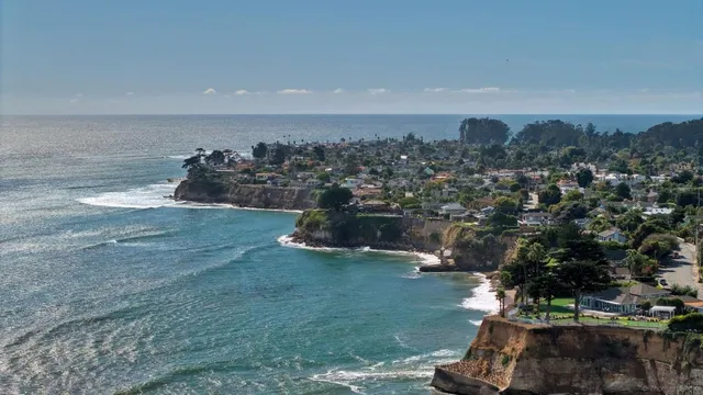 a group of people sitting in a park