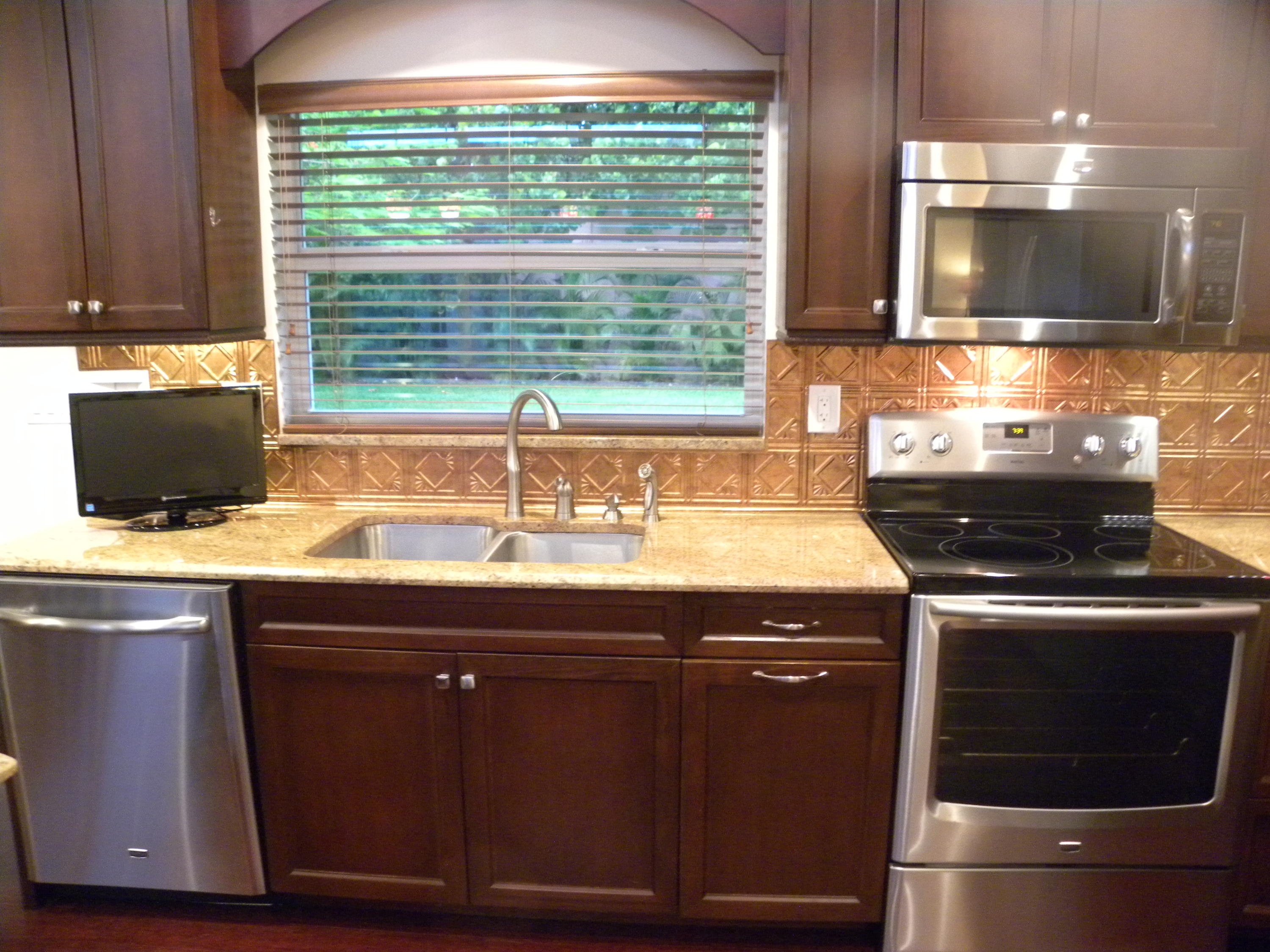 1590 Southwest 14th Drive Boca Raton, FL 33486 - Photo 13 of 48 Kitchen looking onto Lg Yard