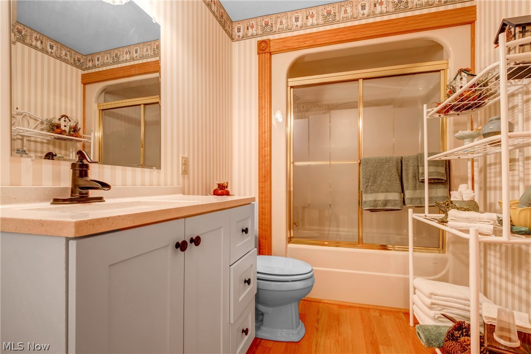 2645 Frost Road Mantua, OH 44255 - Photo 25 of 35 Upstairs full bathroom bath/shower with glass door, vanity, and toilet ceramic title floors