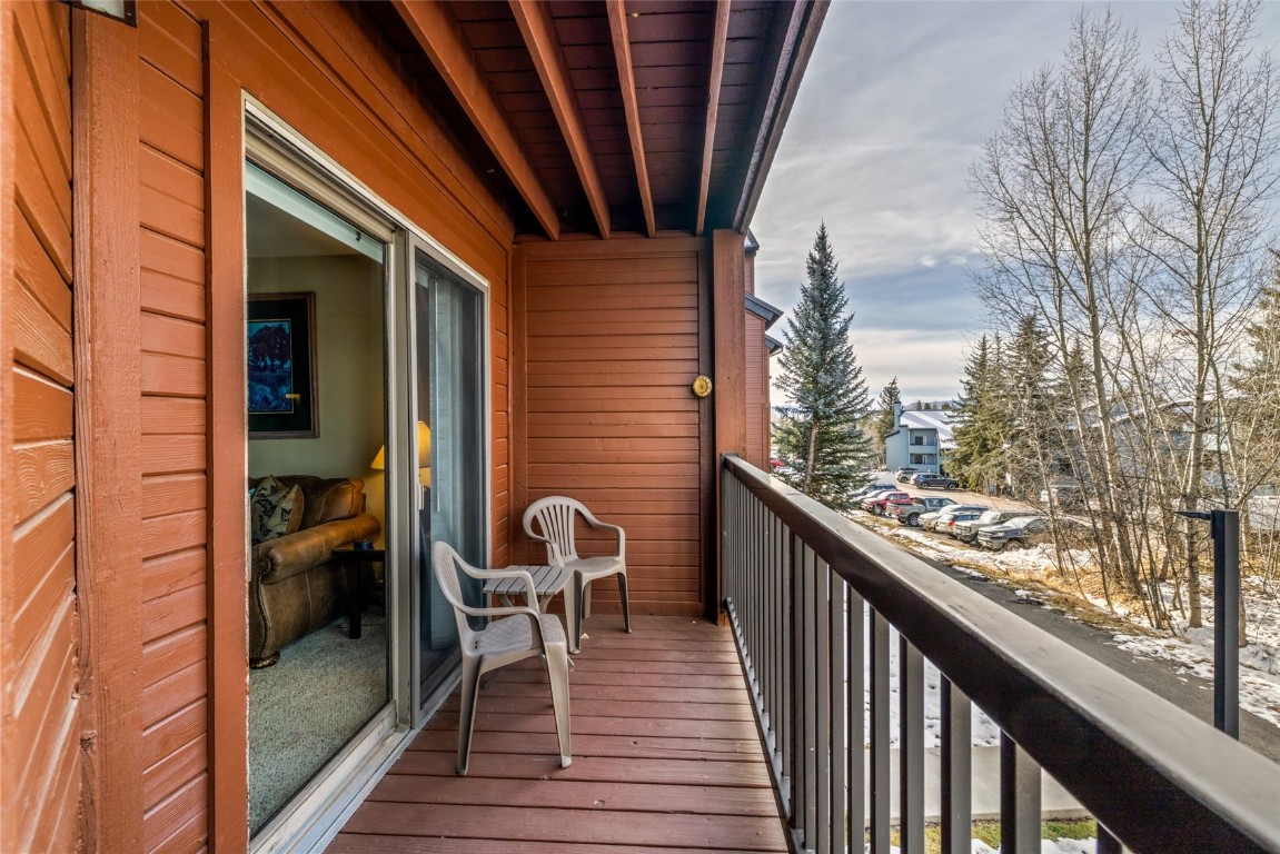 2015 Walton Creek Road, Unit 105 Steamboat Springs, CO 80487 - Photo 21 of 34 a balcony with view of outdoor space